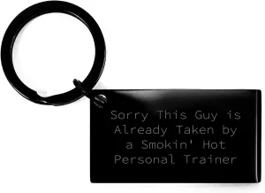 Funny Personal Trainer Gifts from Sweetheart to Sweetheart: Sorry This Guy Is Already Taken By A Smokin' Hot Personal Trainer Engraved Keychain for Christmas